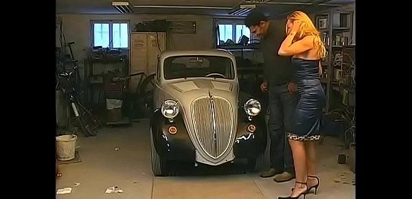  Classy woman banged by black mechanic in a nice old car